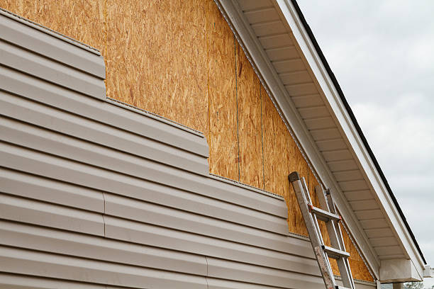 Professional Fiber Cement Siding technician working in Bloomington, TX